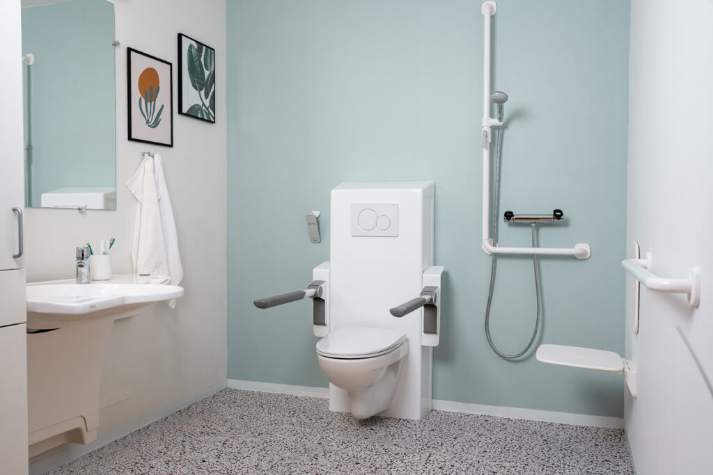 DuraMini shower seat  in an accessible bathroom